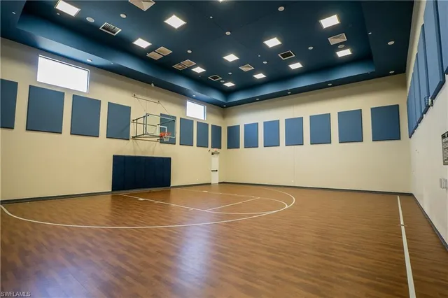 a view of a dining room with furniture and window
