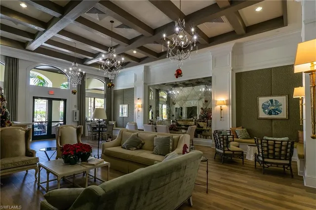 a view of a patio with a dining table and chairs
