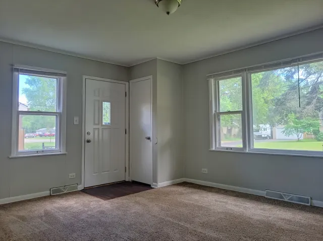 an empty room with windows