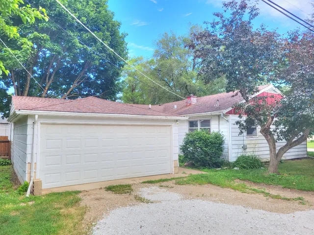 a front view of house with yard