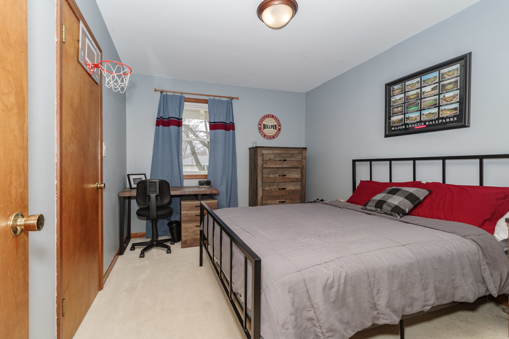 15 Robinwood Drive Normal, IL 61761 - Photo 14 of 35 a bed room with a bed mirror and a window