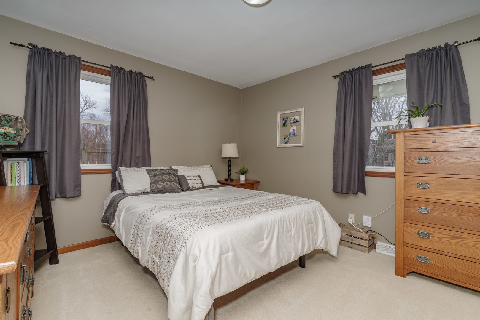 15 Robinwood Drive Normal, IL 61761 - Photo 15 of 35 a bedroom with a bed and a dresser