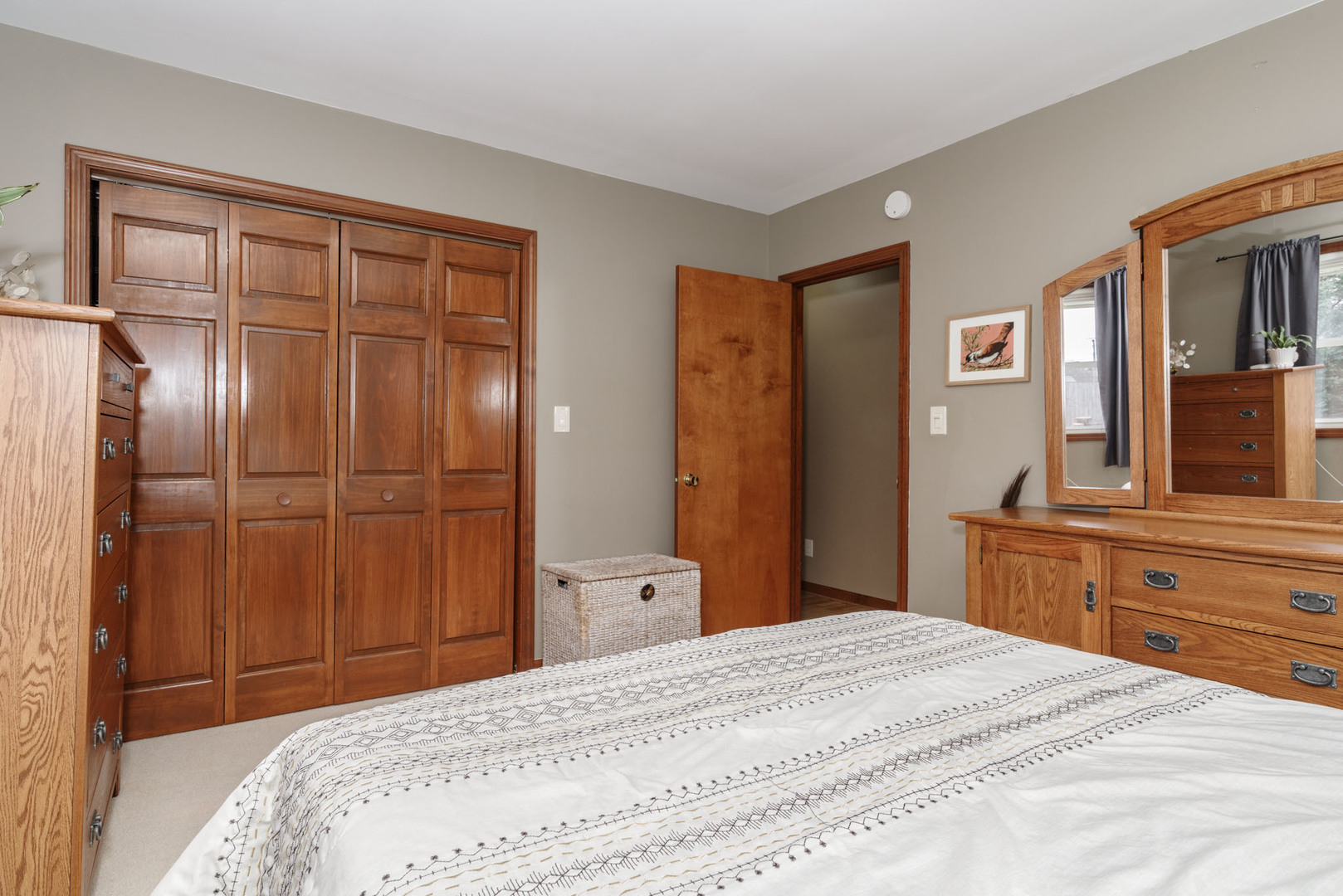 15 Robinwood Drive Normal, IL 61761 - Photo 16 of 35 a bedroom with a bed and a dresser