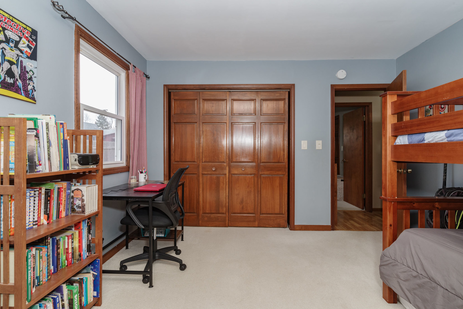 15 Robinwood Drive Normal, IL 61761 - Photo 18 of 35 a livingroom with a bookshelf and a window