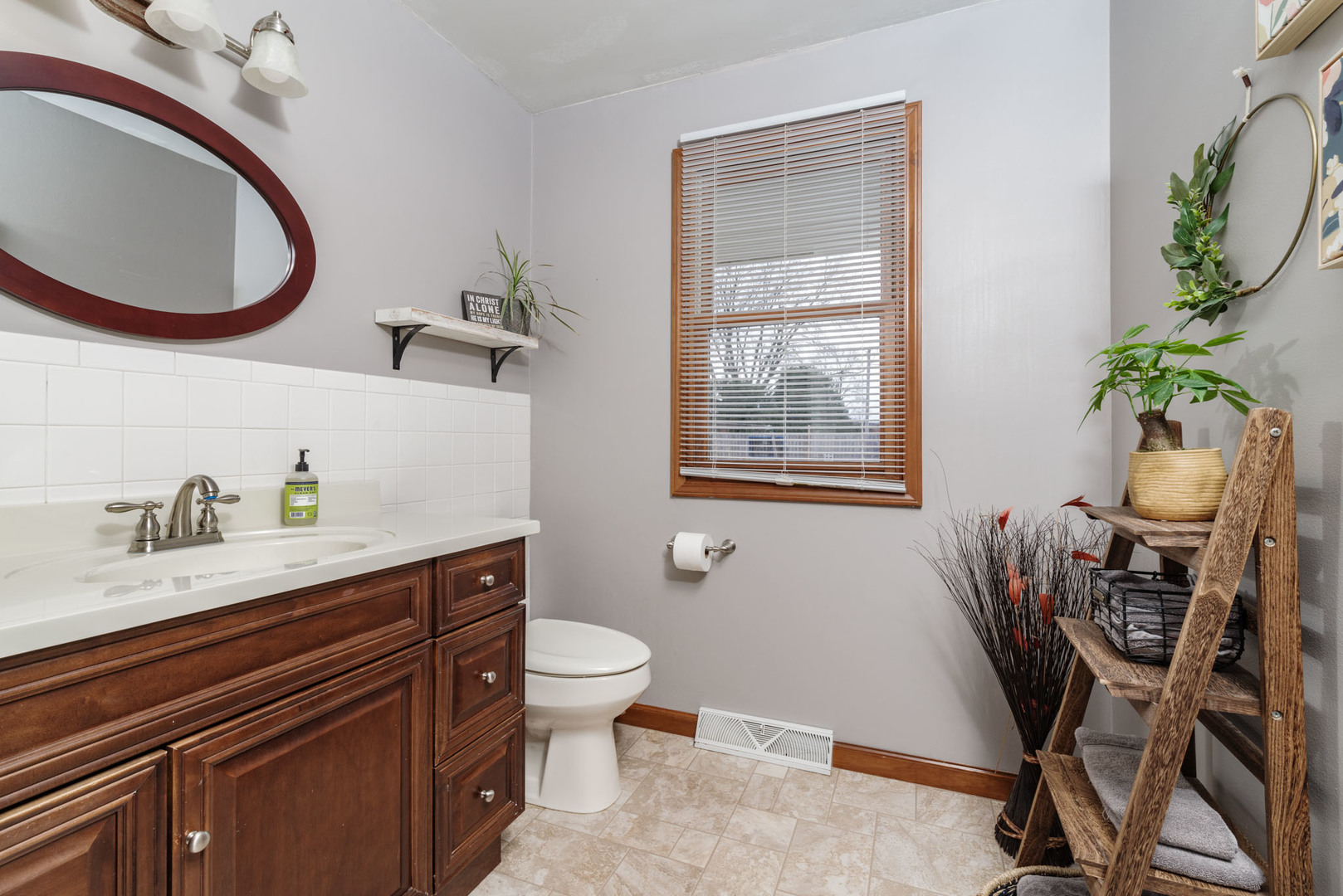 15 Robinwood Drive Normal, IL 61761 - Photo 19 of 35 a bathroom with a toilet a sink and a mirror