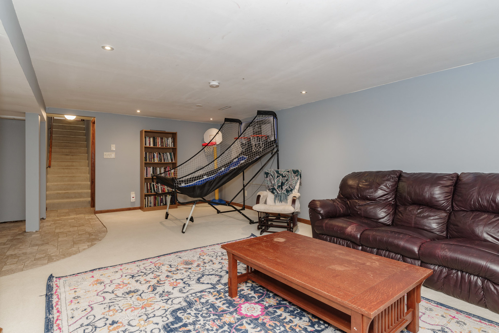 15 Robinwood Drive Normal, IL 61761 - Photo 21 of 35 a living room with a couch and a coffee table
