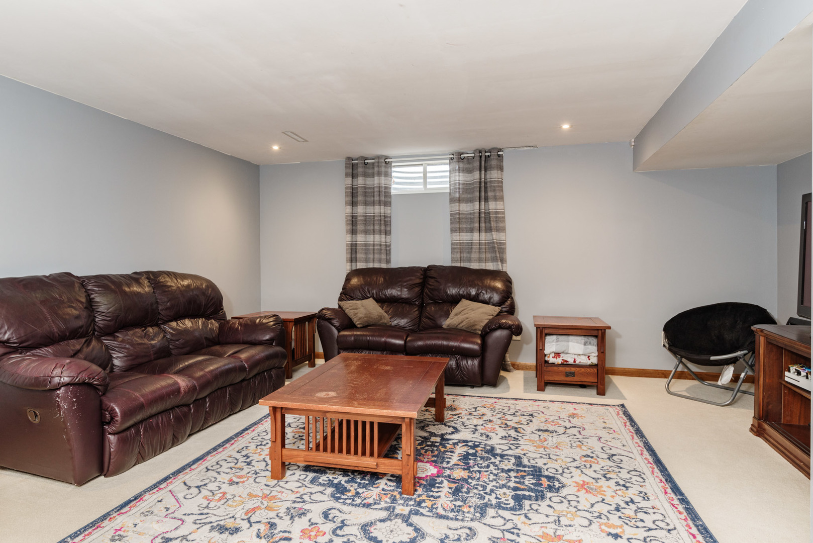 15 Robinwood Drive Normal, IL 61761 - Photo 22 of 35 a living room with furniture and a rug