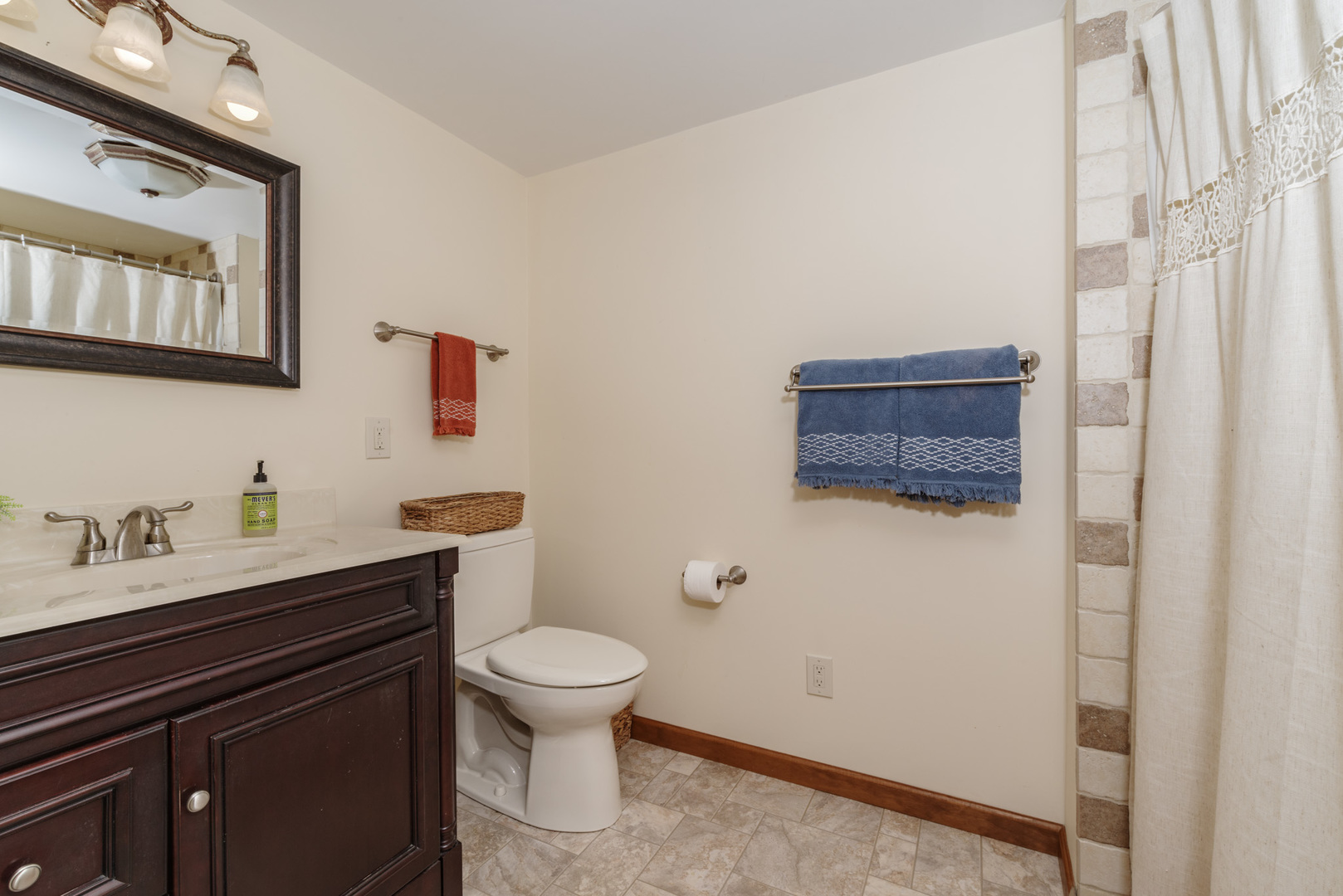 15 Robinwood Drive Normal, IL 61761 - Photo 27 of 35 a bathroom with a toilet sink a mirror and vanity