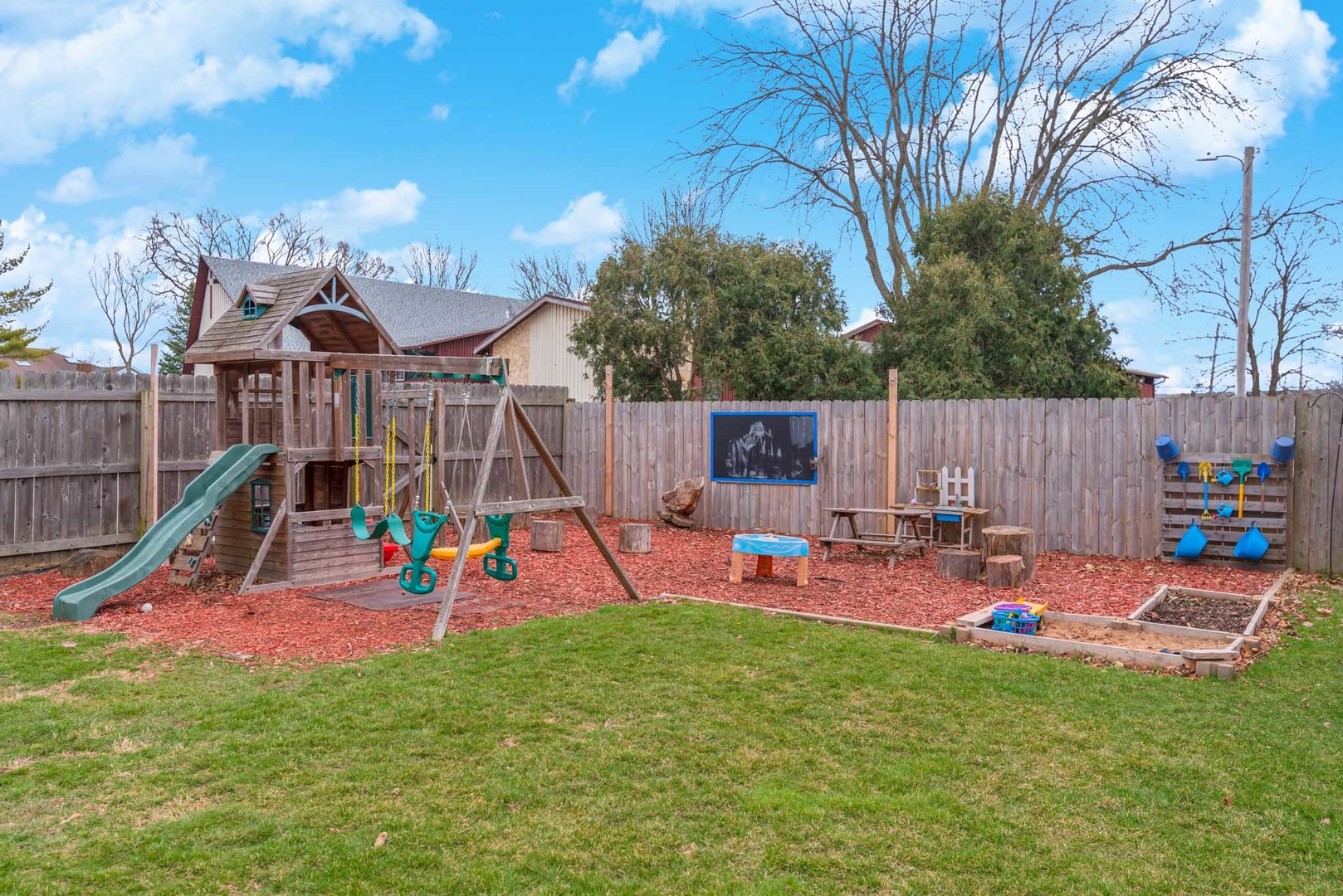 15 Robinwood Drive Normal, IL 61761 - Photo 33 of 35 a view of a park with slide and a slide