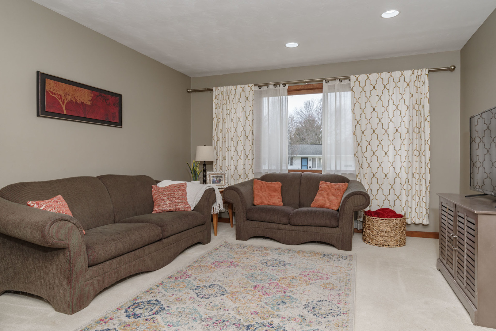 15 Robinwood Drive Normal, IL 61761 - Photo 5 of 35 a living room with furniture and a flat screen tv