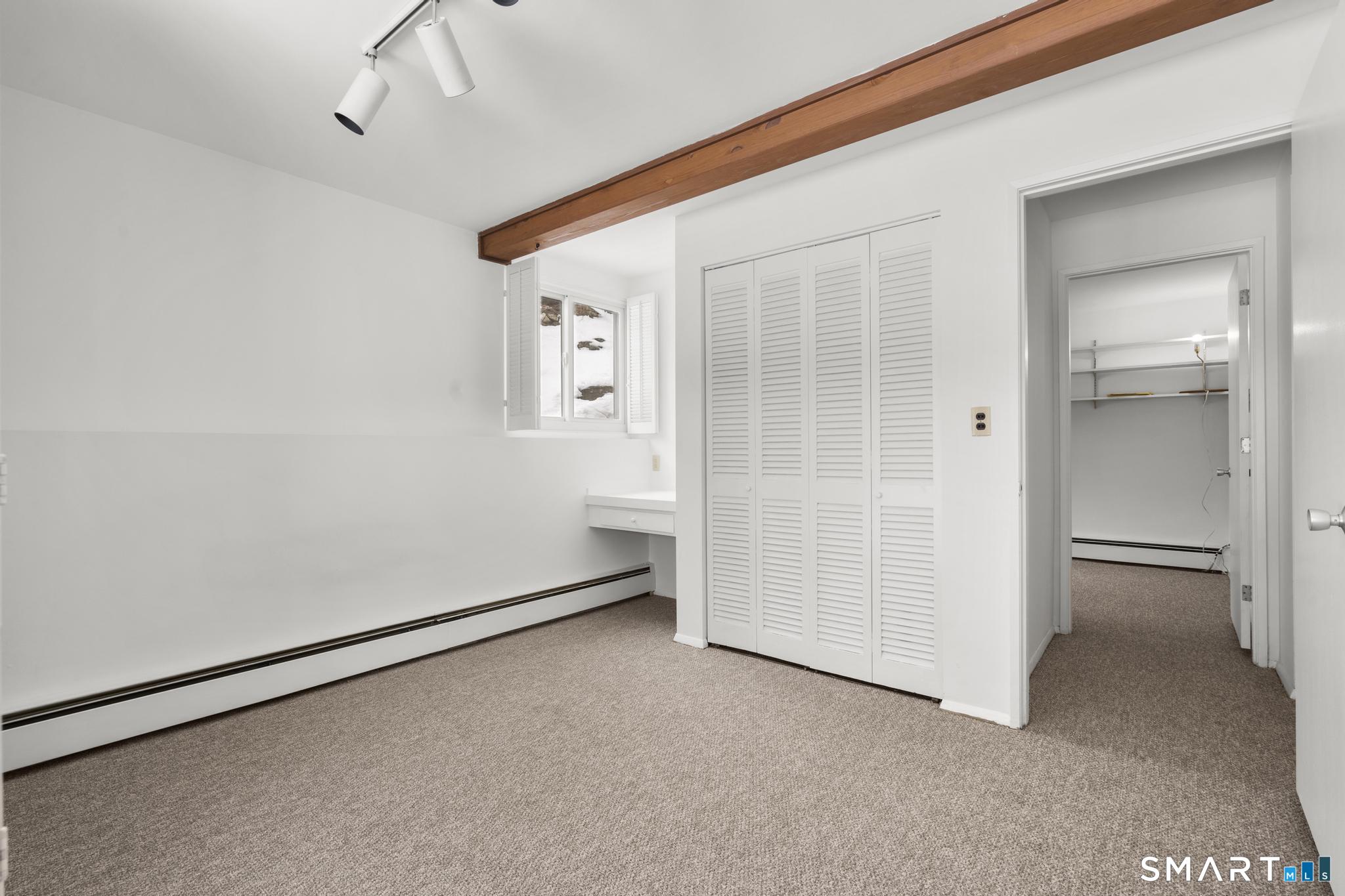 304 Olmstead Hill Road Wilton, CT 06897 - Photo 15 of 35 an empty room with closet