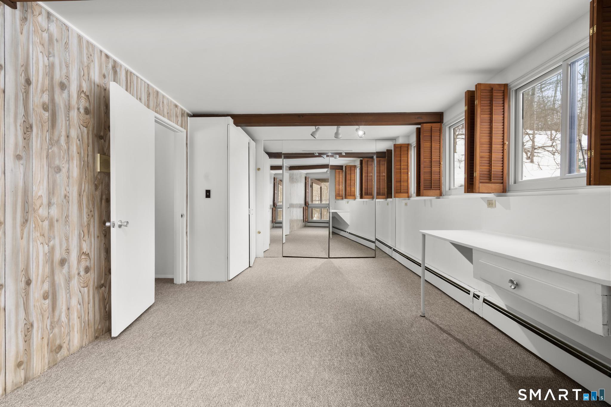 304 Olmstead Hill Road Wilton, CT 06897 - Photo 30 of 35 a view of an empty room