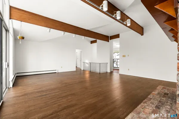 a view of a water heater on the side of a house