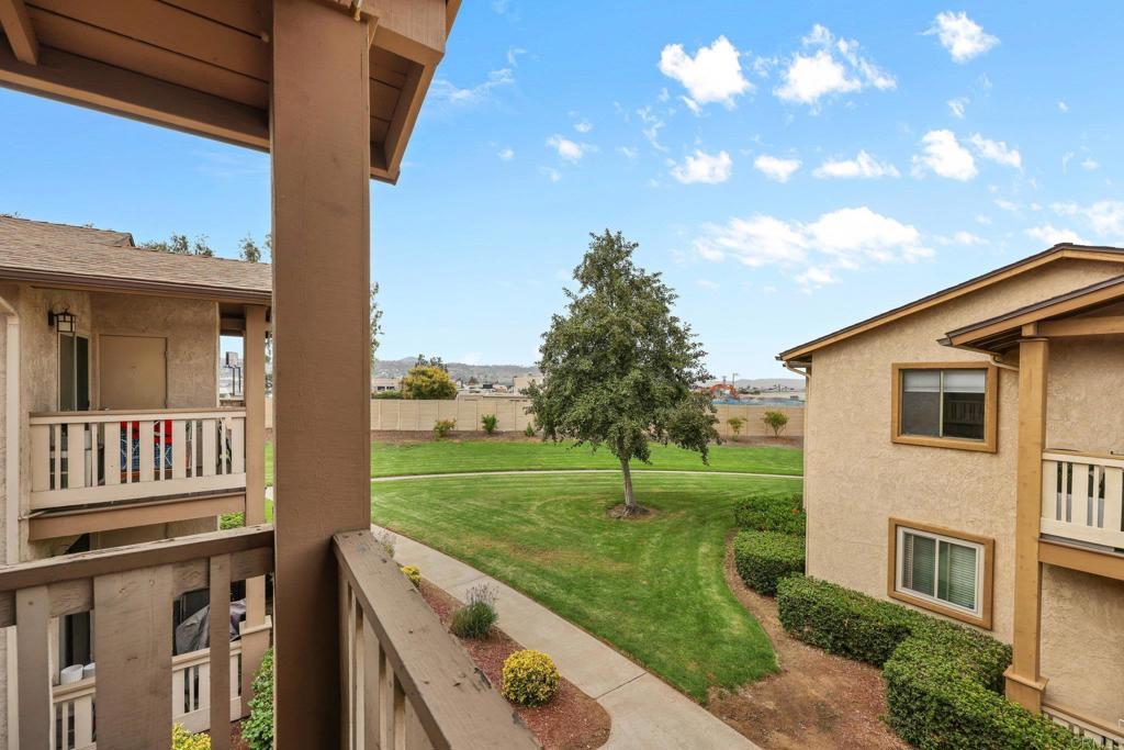 1423 Graves Avenue, Unit 238 El Cajon, CA 92021 - Photo 14 of 25 a view of a house with a yard