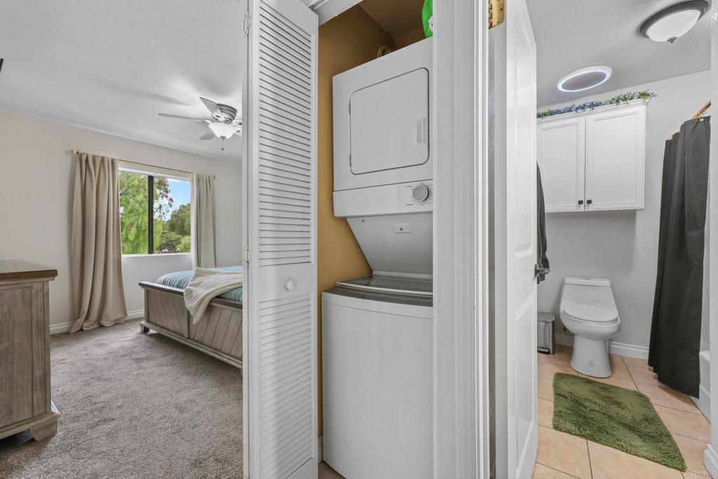 1423 Graves Avenue, Unit 238 El Cajon, CA 92021 - Photo 21 of 25 a bathroom with a toilet a sink and tub