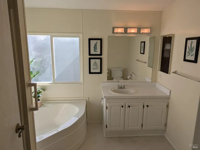 a bathroom with a sink and a bathtub