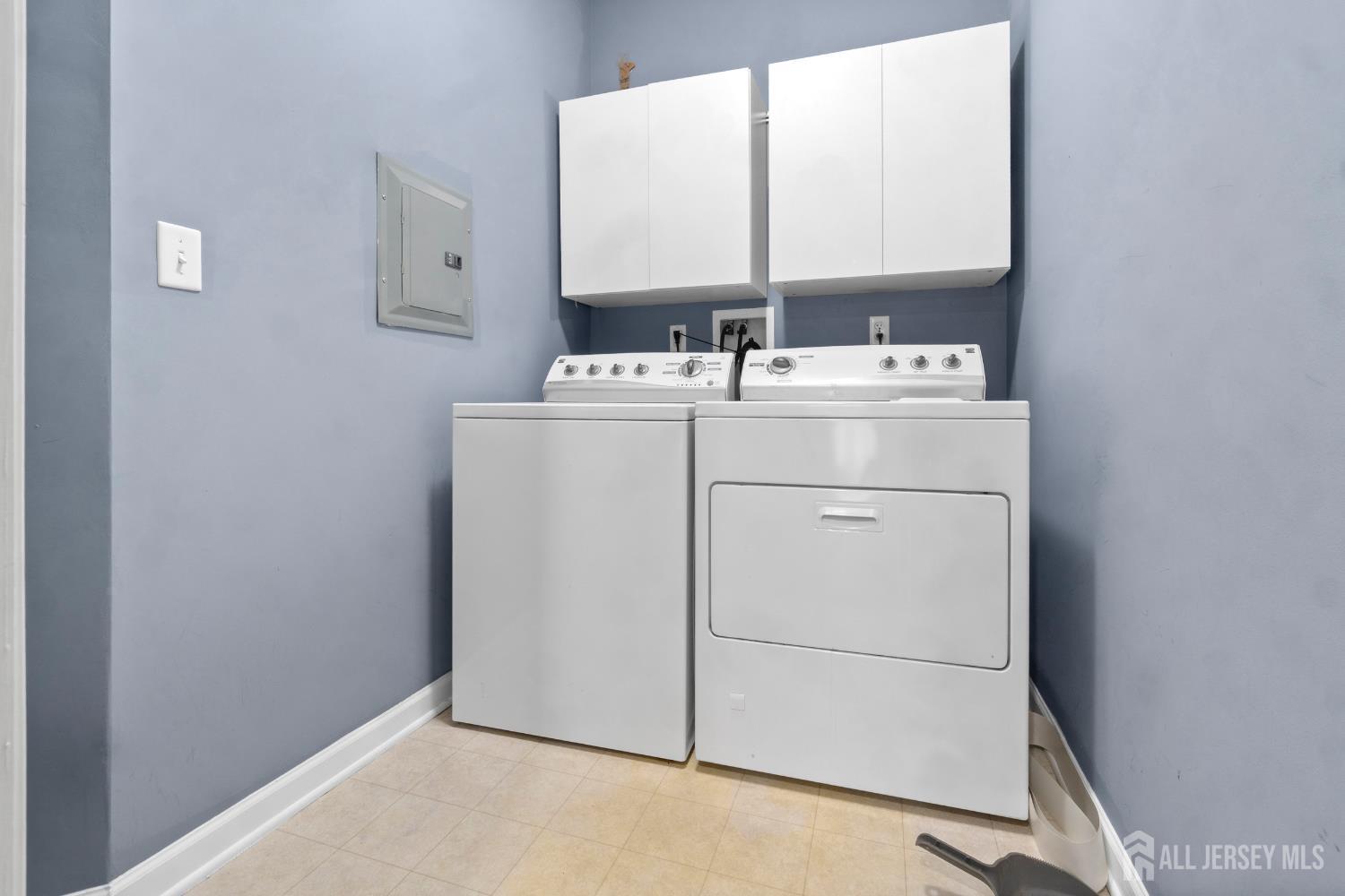 41 Azalea Drive Old Bridge, NJ 08857 - Photo 17 of 18 a utility room with dryer and washer