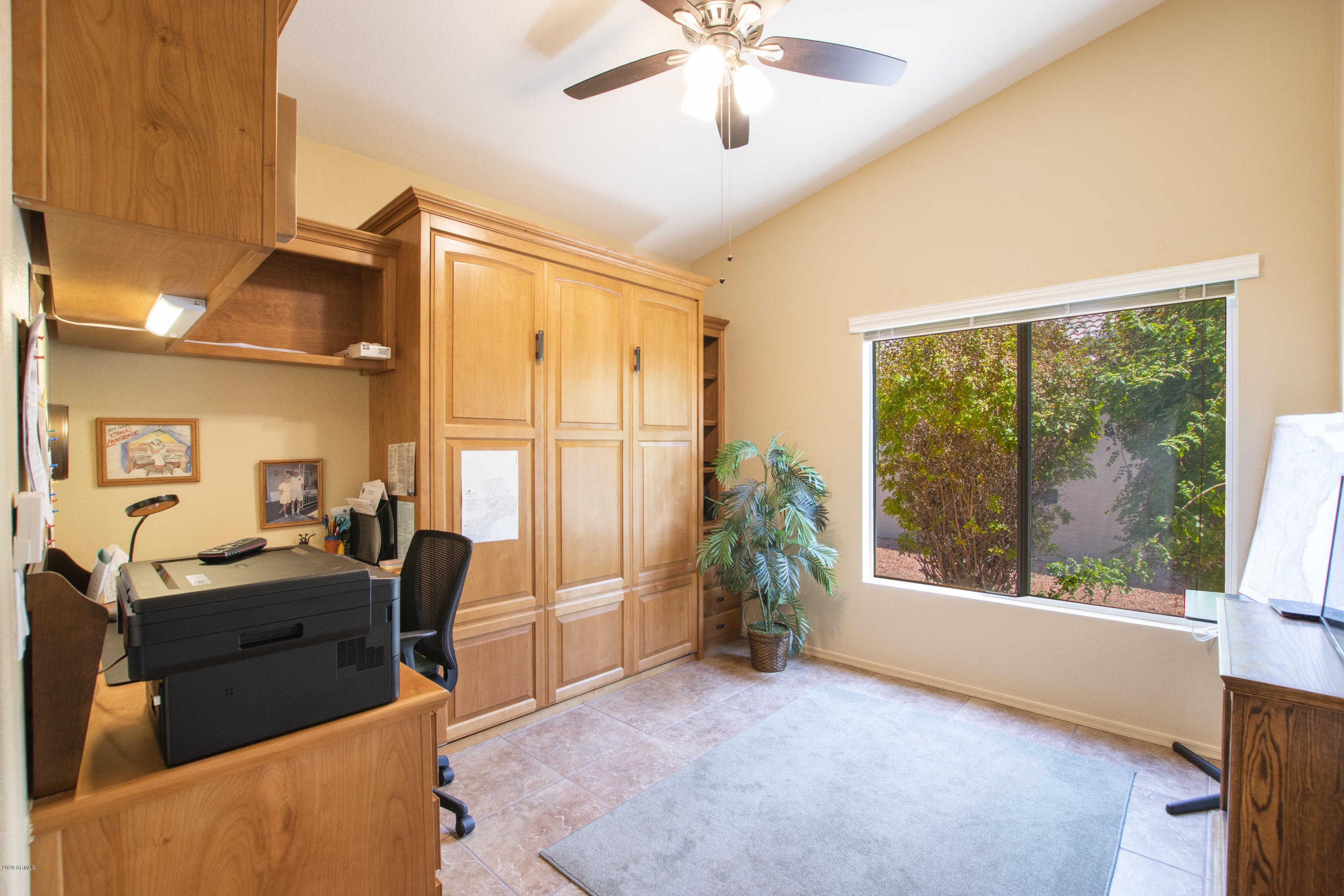 15441 Piccadilly Road Goodyear, AZ 85395 - Photo 23 of 42 Den w/ wall bed and desk