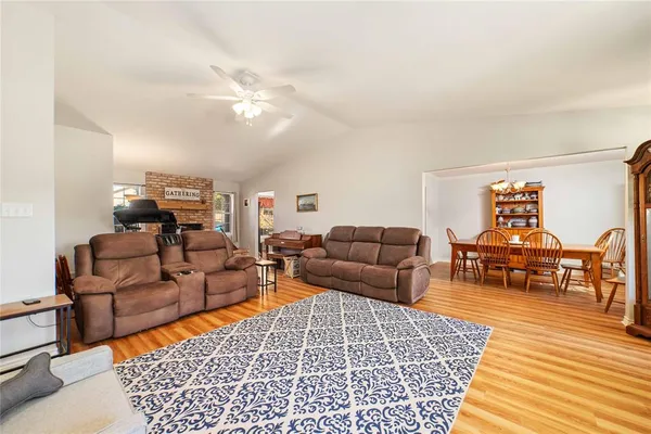 a living room with furniture a rug and a rug