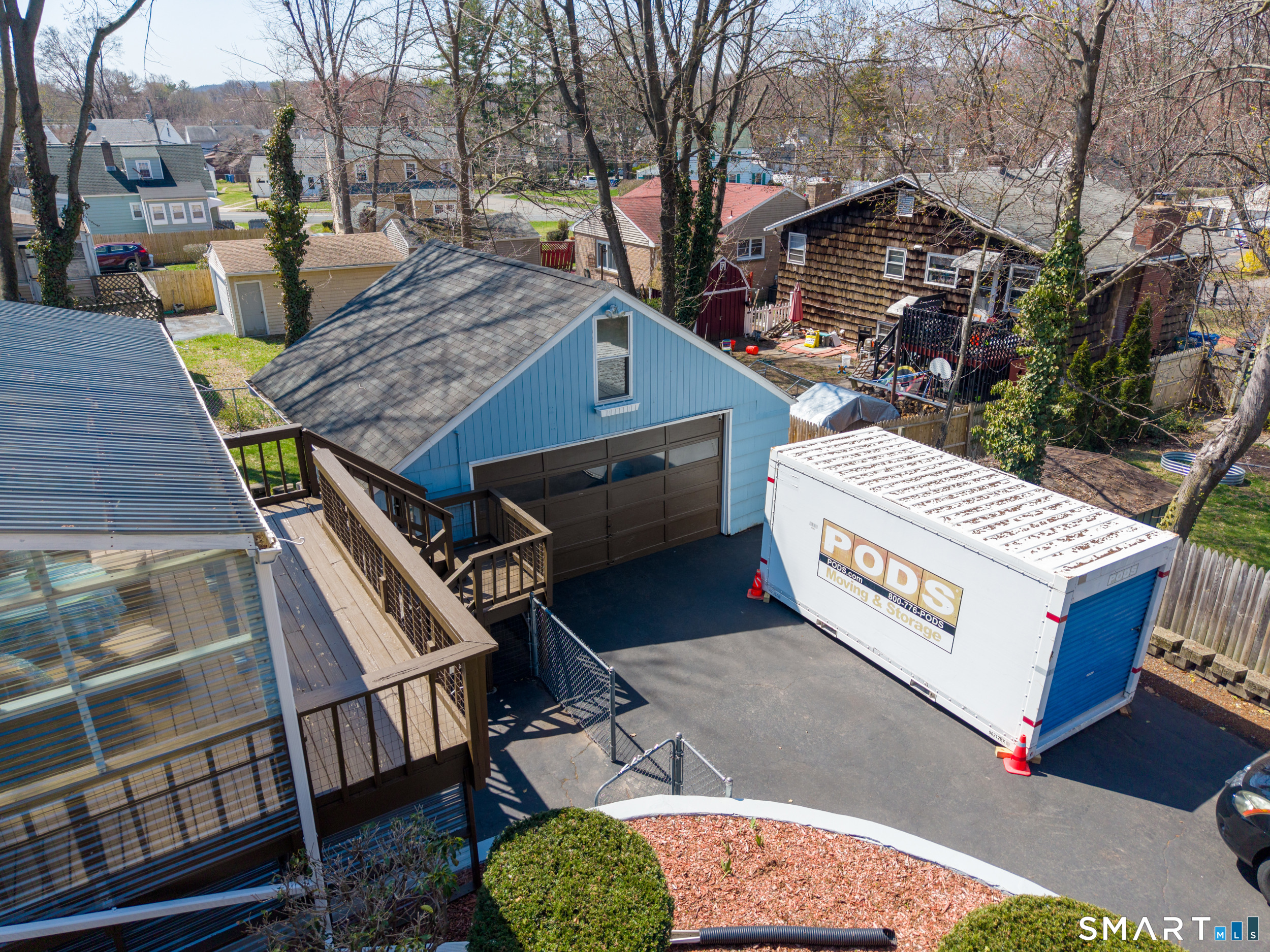 30 Lucy Street Hamden, CT 06514 - Photo 13 of 46 a view of a roof deck with couches and wooden floor