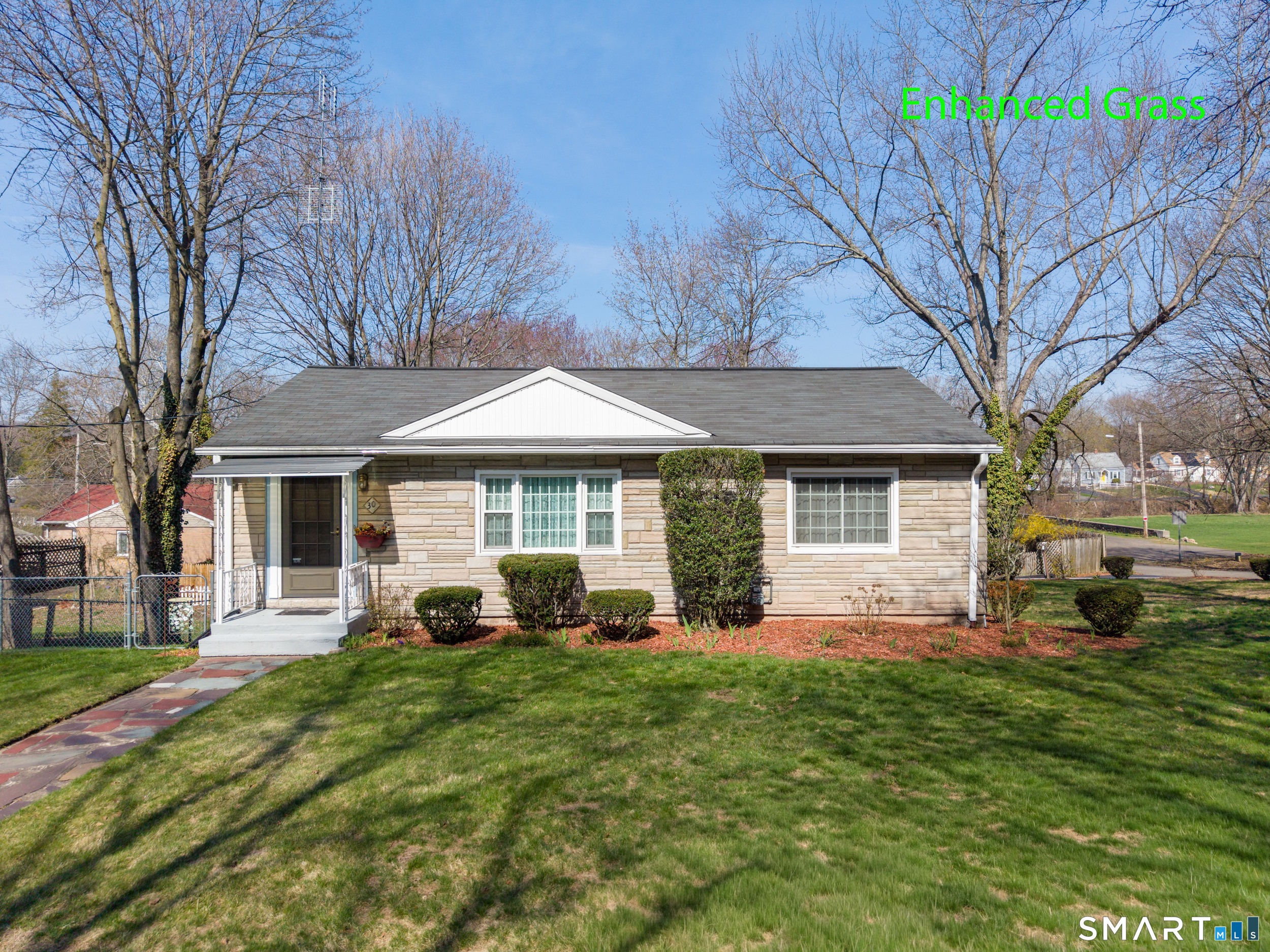 30 Lucy Street Hamden, CT 06514 - Photo 5 of 46 a front view of a house with a yard