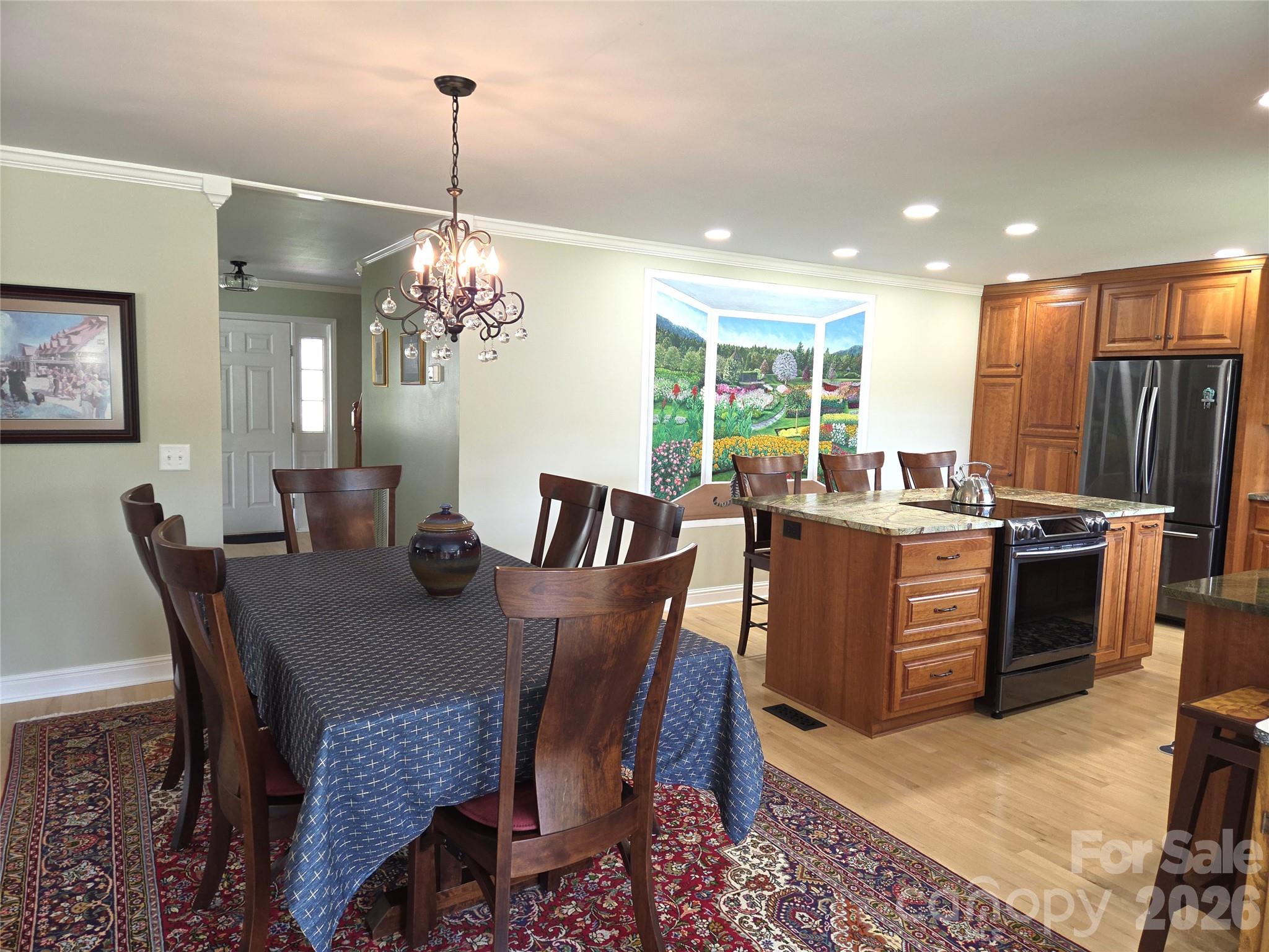 729 Sternbridge Drive Concord, NC 28025 - Photo 15 of 42 a view of a dining room with furniture window and chandelier