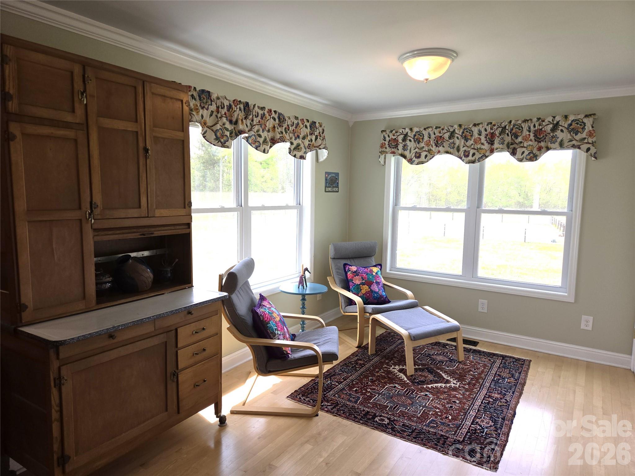 729 Sternbridge Drive Concord, NC 28025 - Photo 17 of 42 a living room with furniture windows and a fireplace