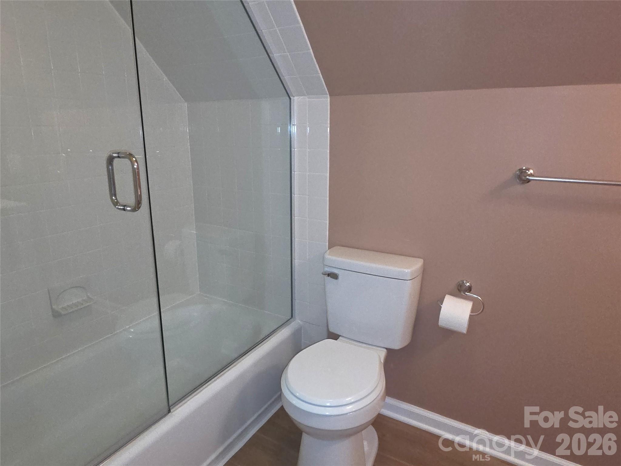 729 Sternbridge Drive Concord, NC 28025 - Photo 26 of 42 a white toilet sitting next to a bath tub and a shower