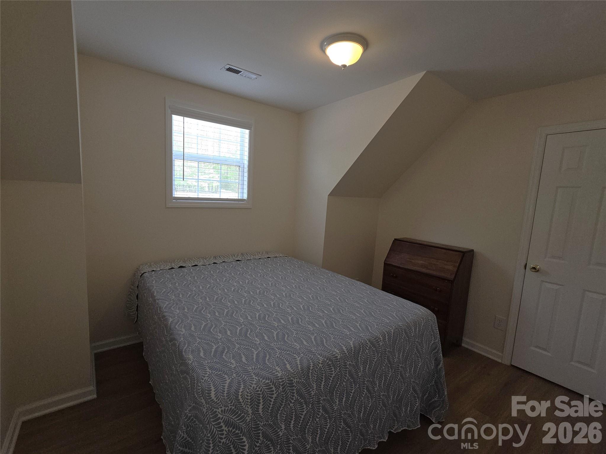 729 Sternbridge Drive Concord, NC 28025 - Photo 27 of 42 a bedroom with a bed and a window