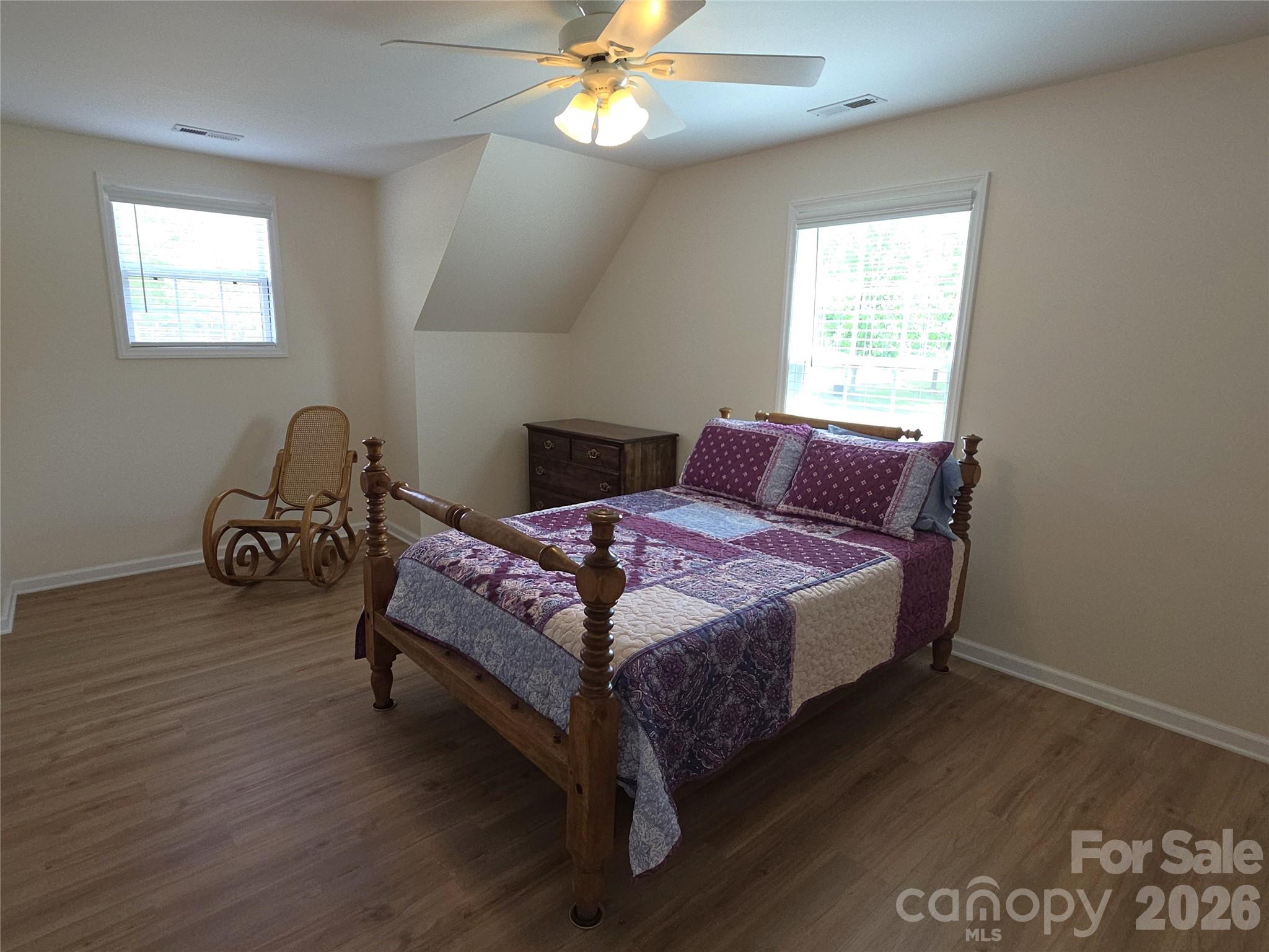 729 Sternbridge Drive Concord, NC 28025 - Photo 28 of 42 a bedroom with a bed chair and window