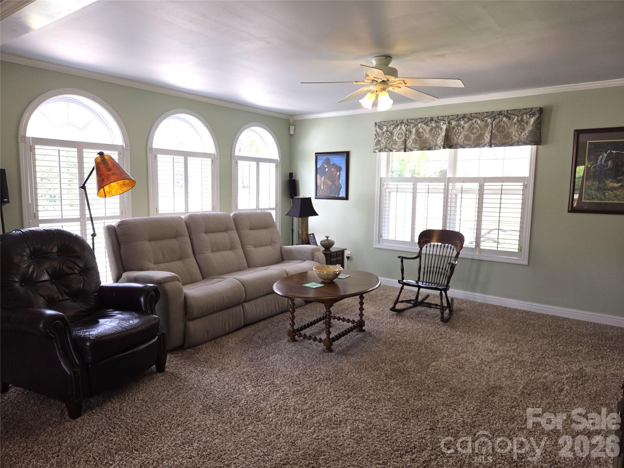 729 Sternbridge Drive Concord, NC 28025 - Photo 10 of 42 a living room with furniture and a large window