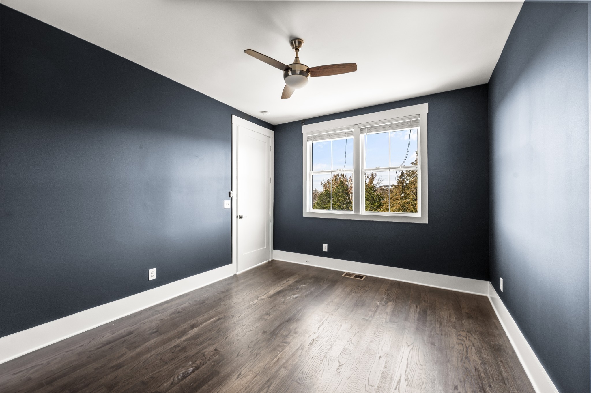 1000 Free Silver Road Nashville, TN 37207 - Photo 35 of 45 wooden floor in an empty room with a window