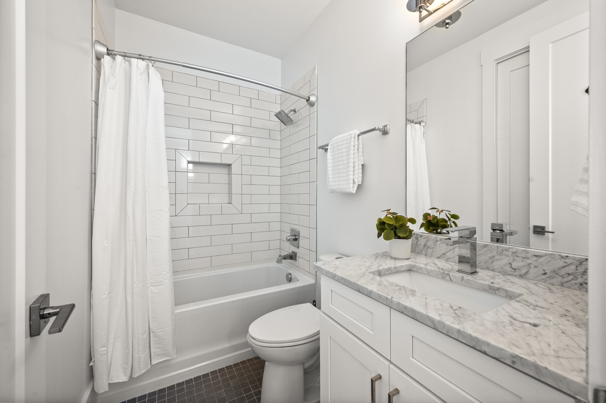 1000 Free Silver Road Nashville, TN 37207 - Photo 36 of 45 a bathroom with a granite countertop sink toilet and shower
