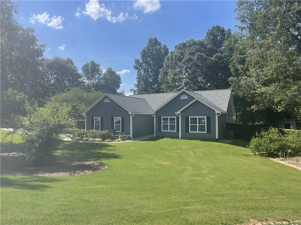 475 Flintlock Drive Dacula, GA 30019 - Photo 1 of 1 a front view of a house with a yard