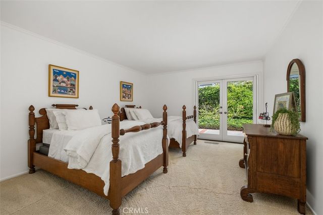 a bed room with a bed and a couch