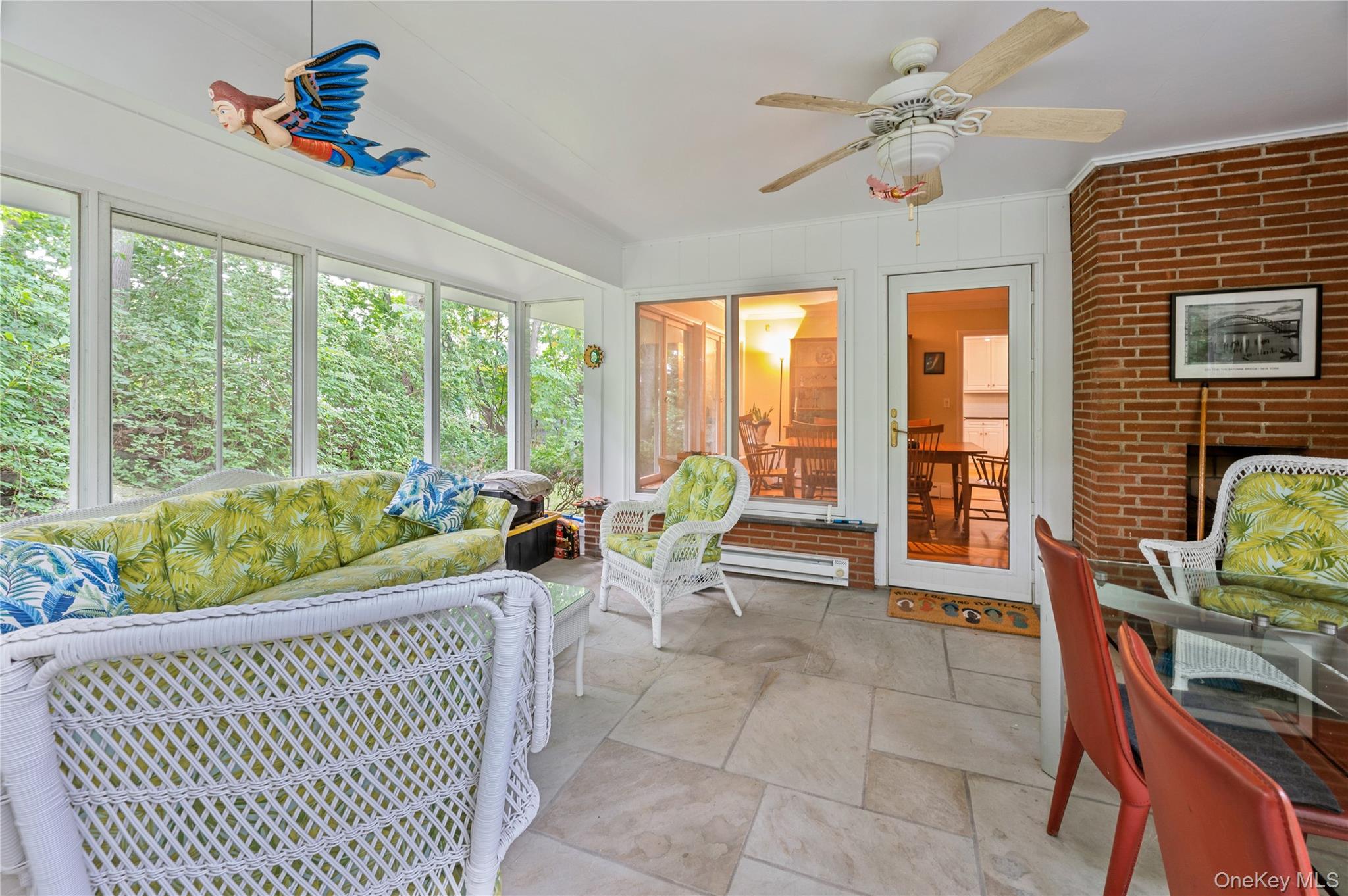 160 Hampshire Road Bronxville, NY 10708 - Photo 13 of 36 a living room with furniture and floor to ceiling windows