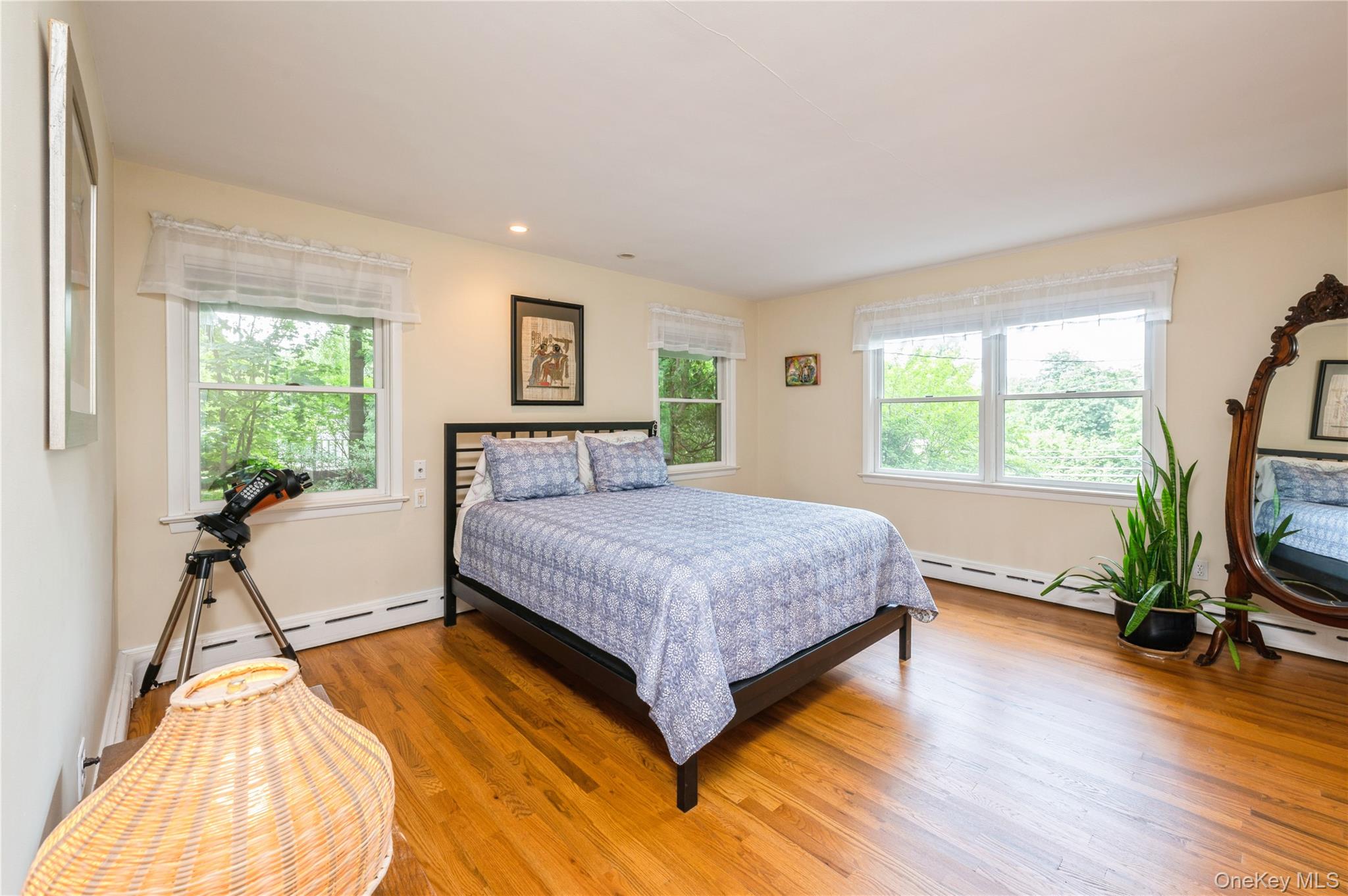 160 Hampshire Road Bronxville, NY 10708 - Photo 26 of 36 a bedroom with a bed and a flat screen tv
