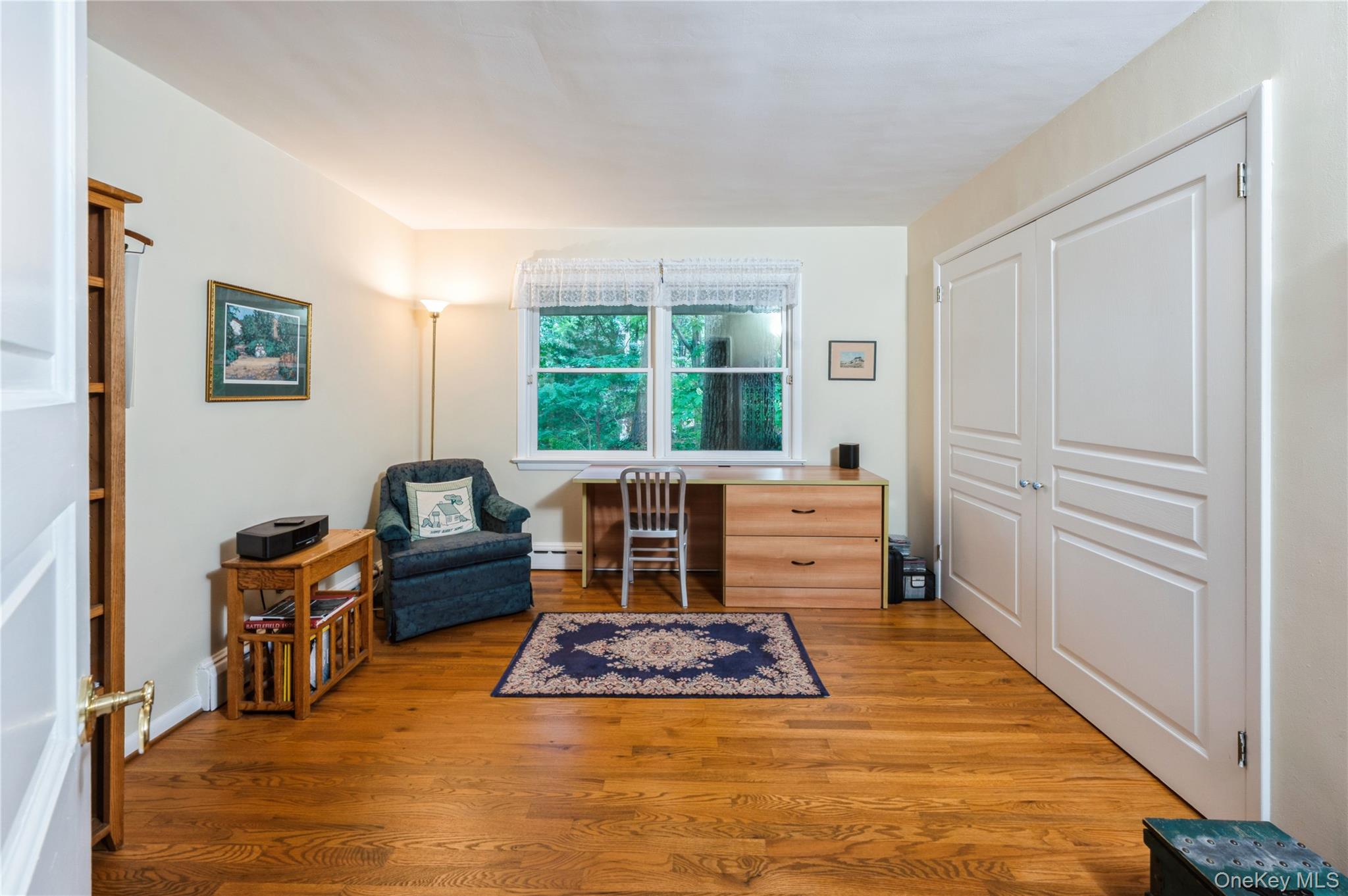 160 Hampshire Road Bronxville, NY 10708 - Photo 28 of 36 a living room with furniture rug and window