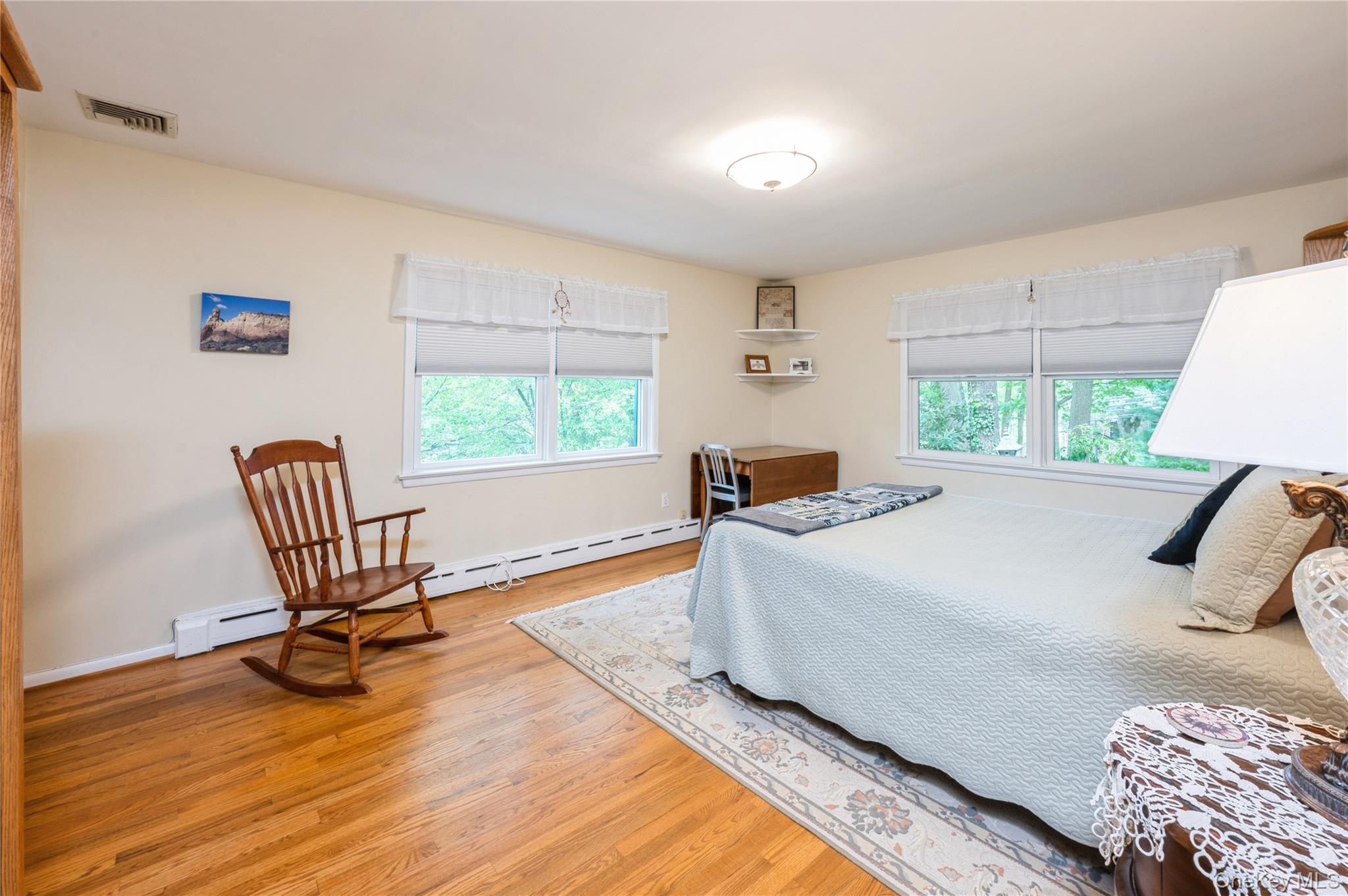 160 Hampshire Road Bronxville, NY 10708 - Photo 30 of 36 a bedroom with a bed chair and window