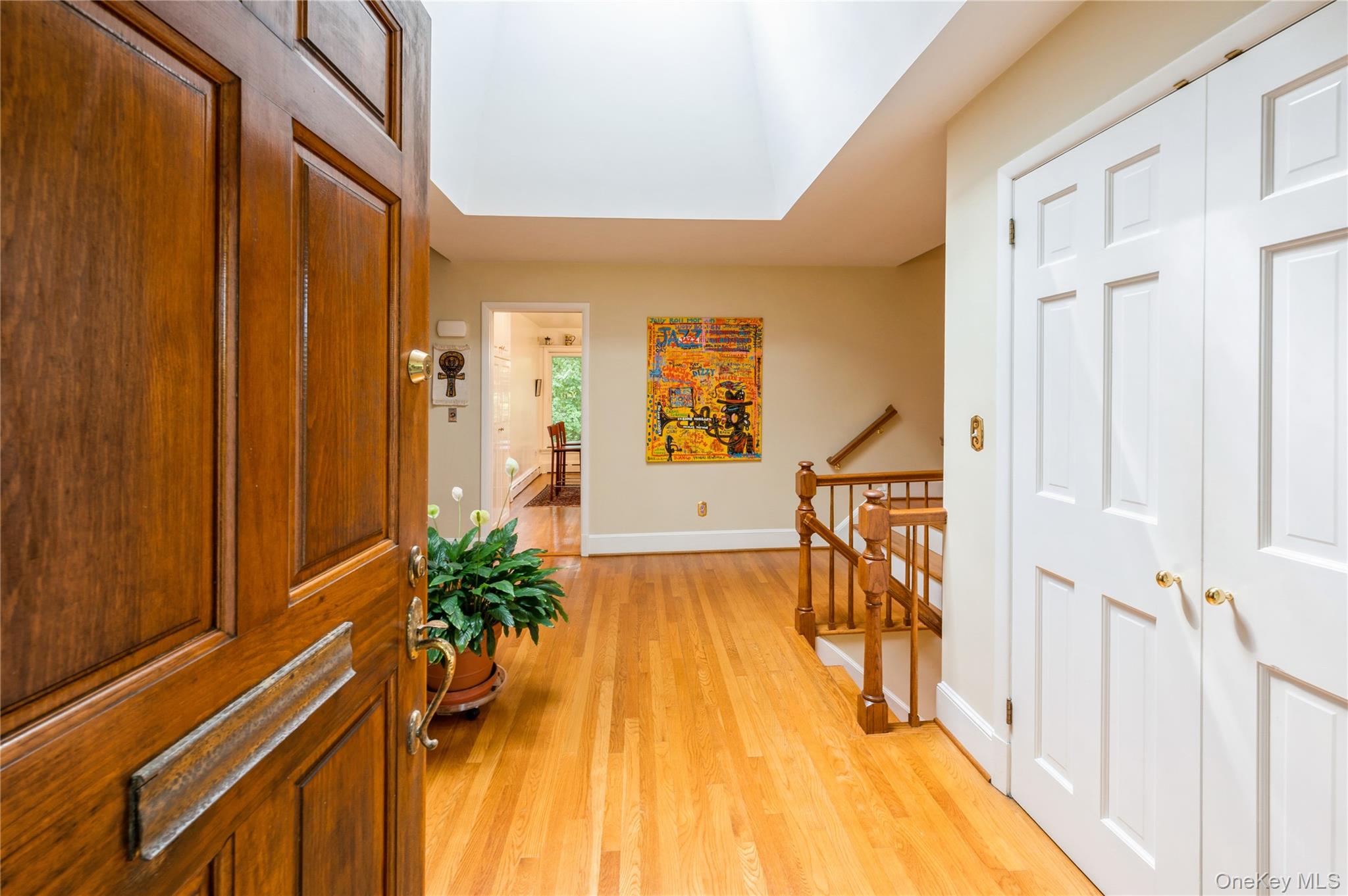 160 Hampshire Road Bronxville, NY 10708 - Photo 4 of 36 a view of a hallway with wooden floor and stairs