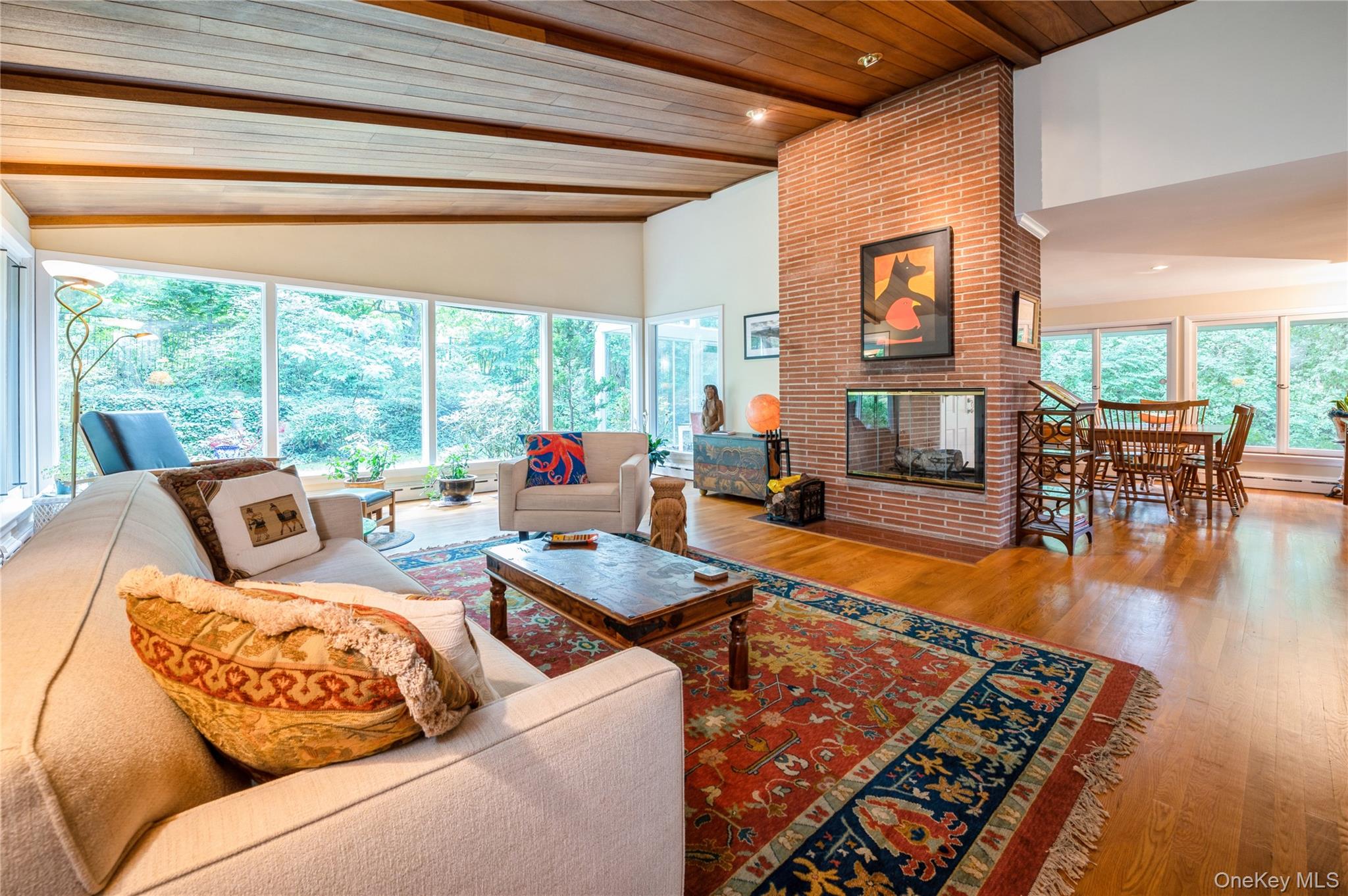 160 Hampshire Road Bronxville, NY 10708 - Photo 8 of 36 a living room with furniture and a large window