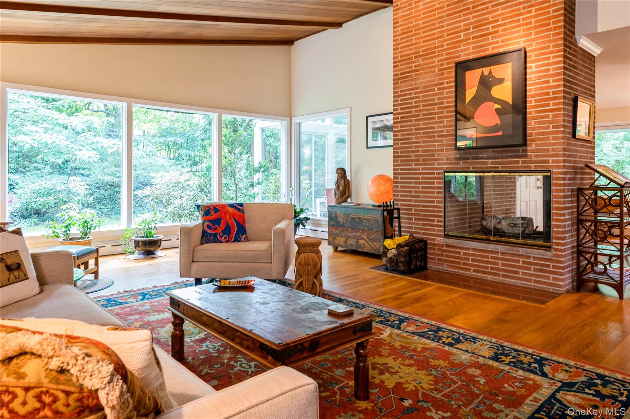 160 Hampshire Road Bronxville, NY 10708 - Photo 9 of 36 a living room with patio furniture and a potted plant