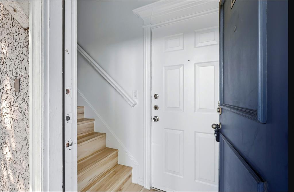 2601 Preston Road, Unit 1201 Plano, TX 75093 - Photo 3 of 28 a view of a hallway with wooden floor and entryway