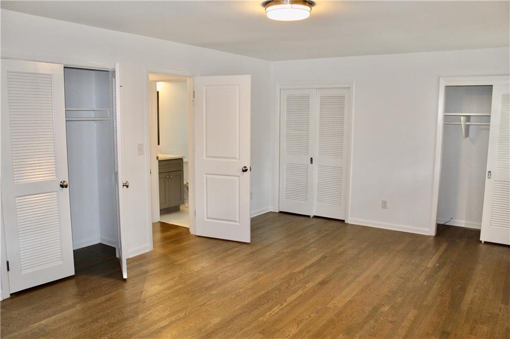 1191 Hampton Way Northeast Atlanta, GA 30324 - Photo 12 of 31 a view of empty room with wooden floor