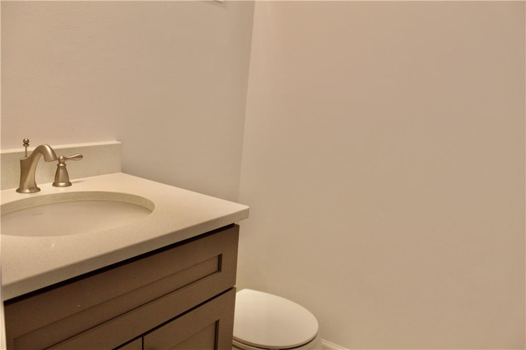 1191 Hampton Way Northeast Atlanta, GA 30324 - Photo 18 of 31 a bathroom with a sink and a toilet