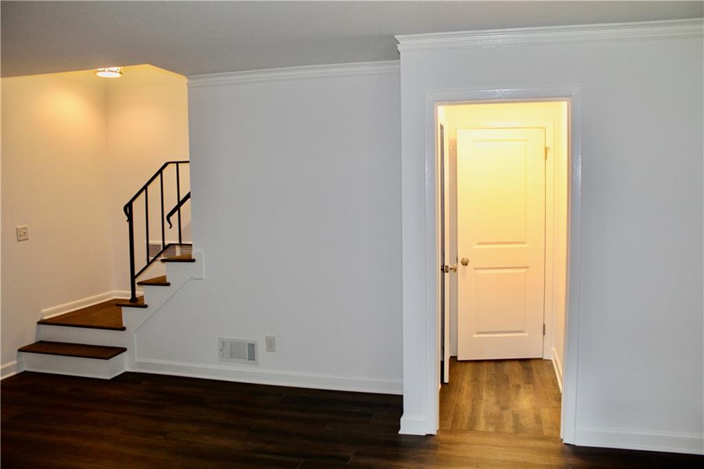 1191 Hampton Way Northeast Atlanta, GA 30324 - Photo 19 of 31 a view of entryway with wooden floor