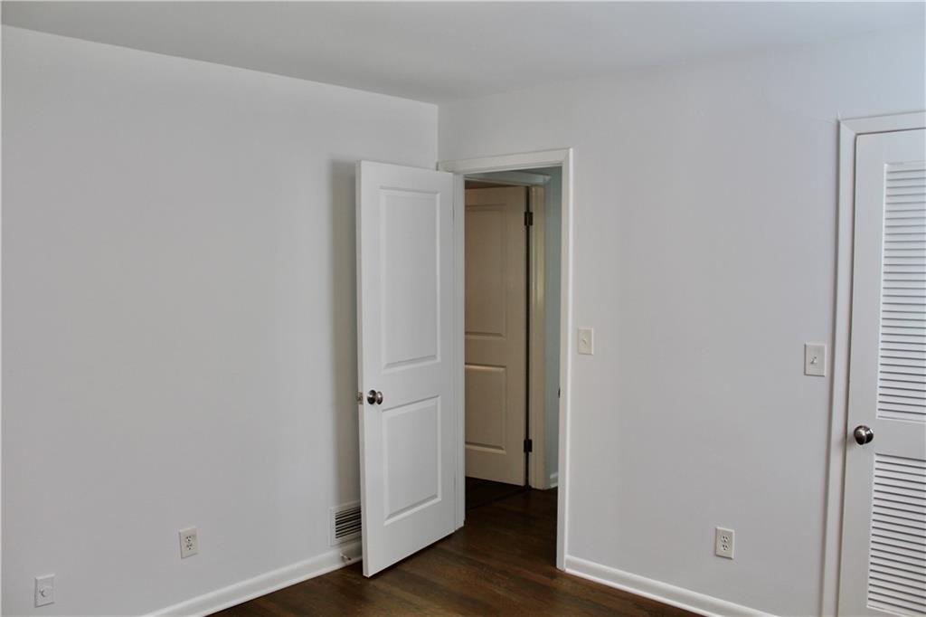 1191 Hampton Way Northeast Atlanta, GA 30324 - Photo 27 of 31 a view of small space with wooden floor