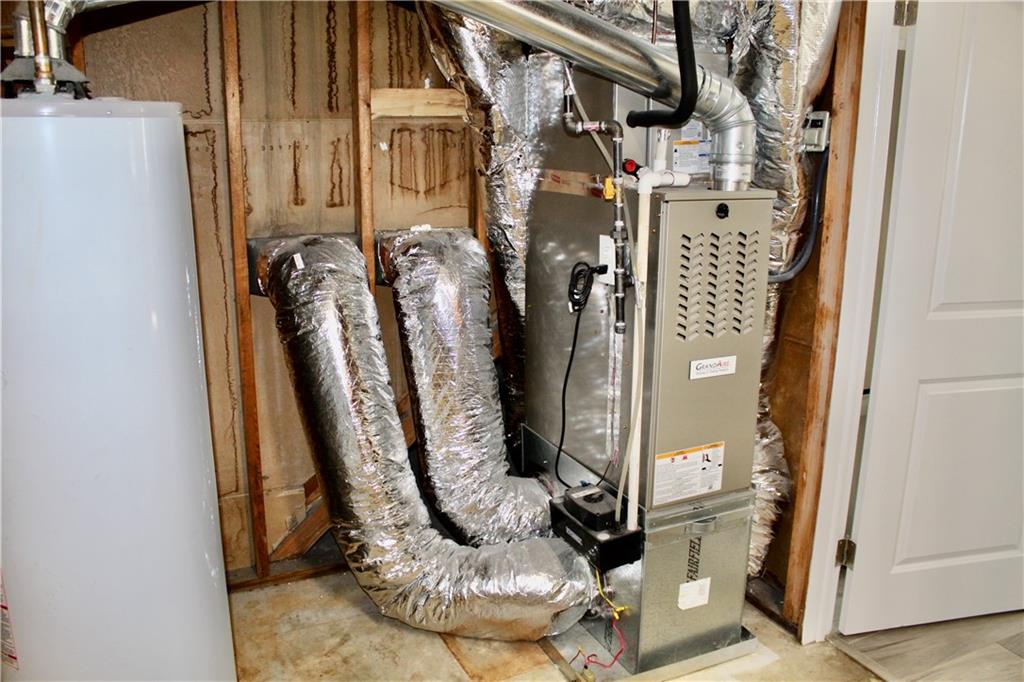 1191 Hampton Way Northeast Atlanta, GA 30324 - Photo 30 of 31 a view of a water heater room