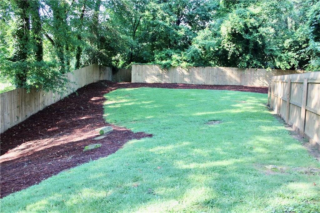 1191 Hampton Way Northeast Atlanta, GA 30324 - Photo 6 of 31 a view of yard with green space