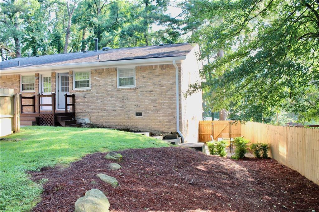 1191 Hampton Way Northeast Atlanta, GA 30324 - Photo 7 of 31 a view of a back yard with an outdoor space